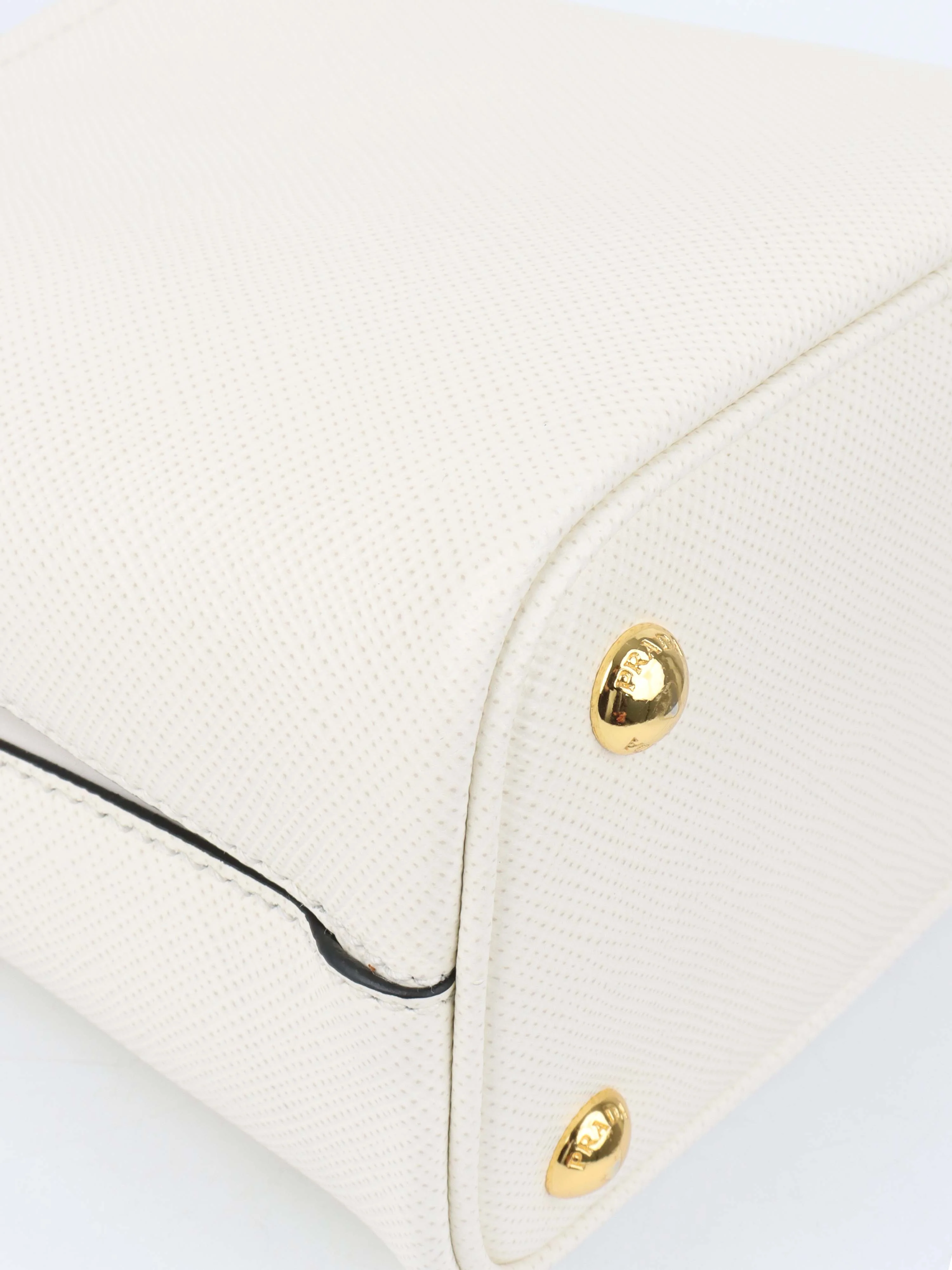 Prada Small Saffiano White Panier Bag.