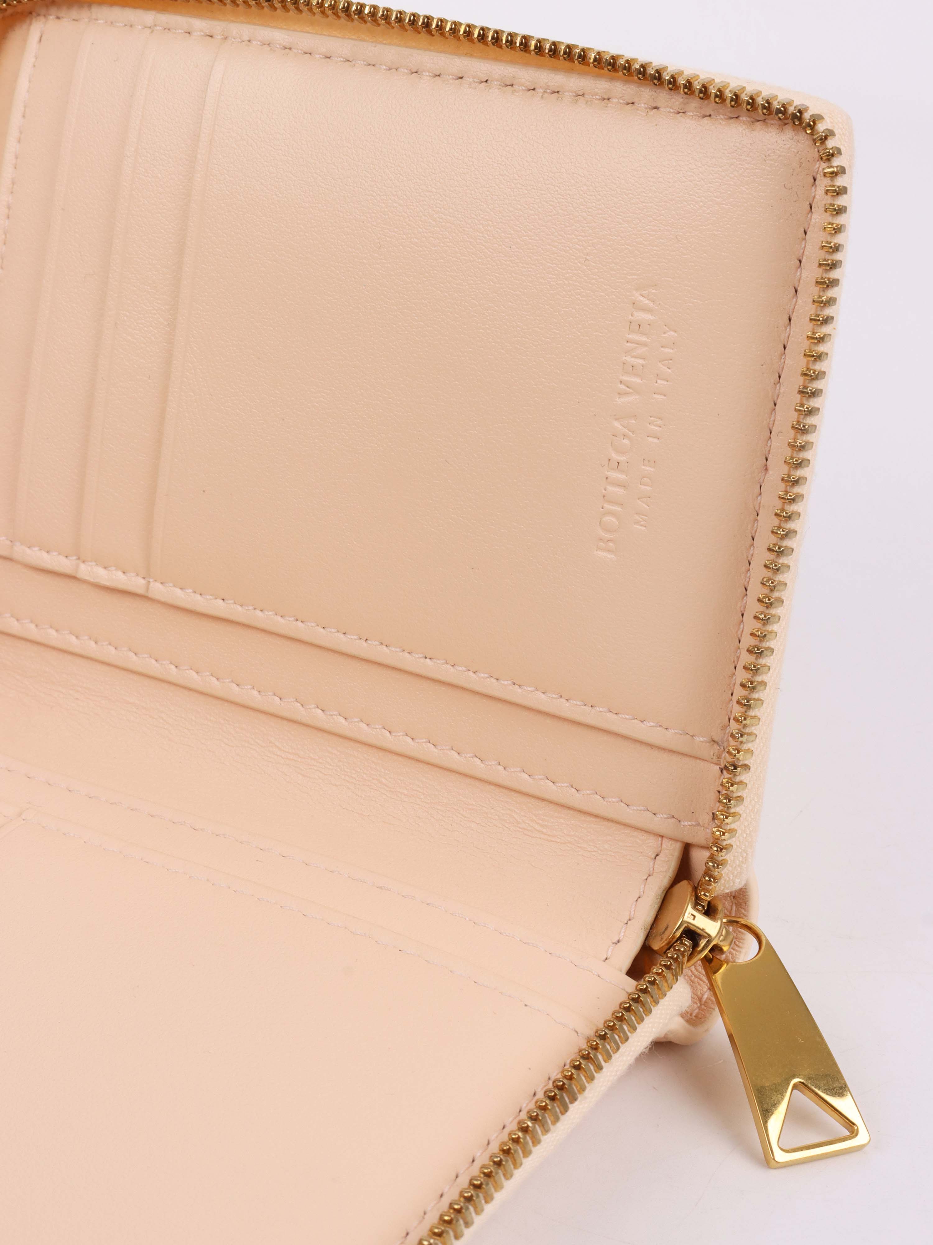 Bottega Veneta Light Pink Cassette Small Bi-Fold Wallet.
