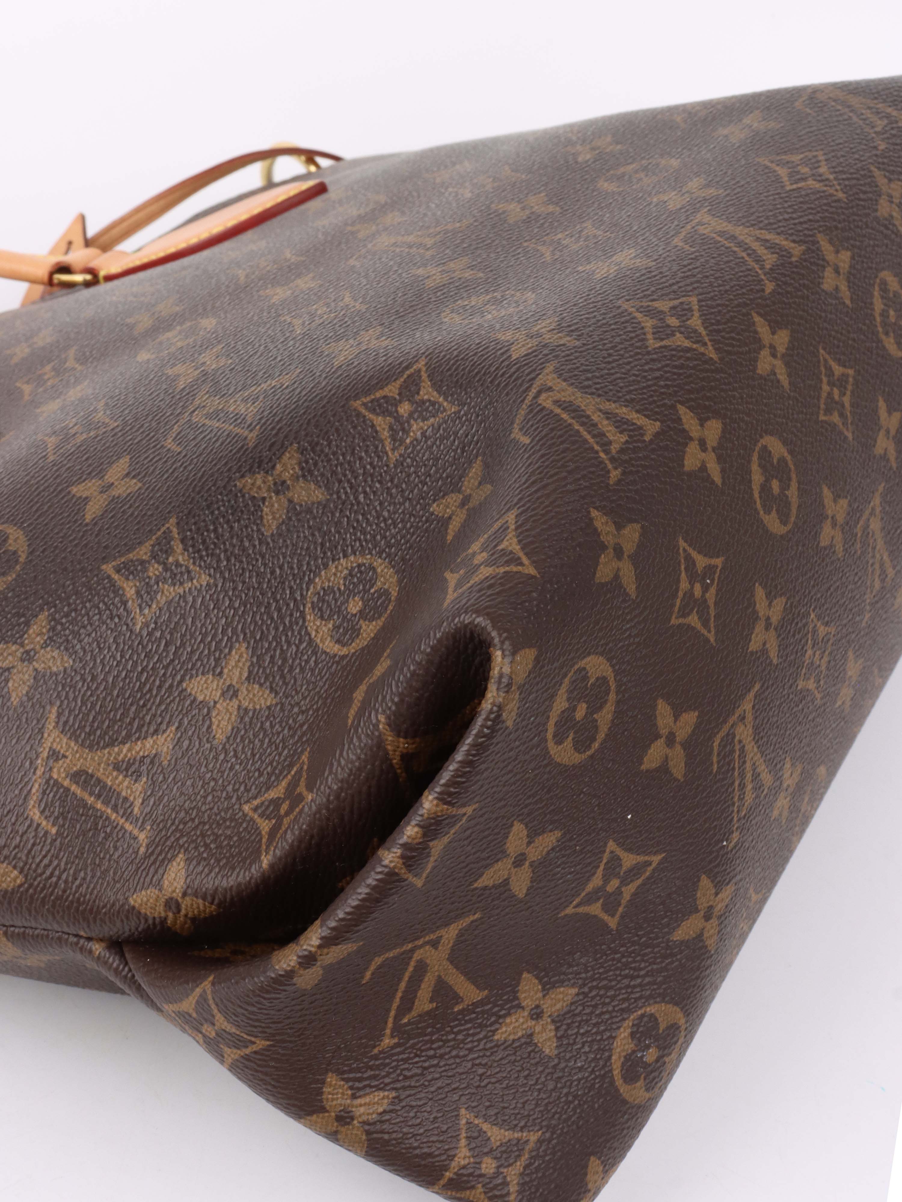 Louis Vuitton Monogram MM Flower Zipped Tote.