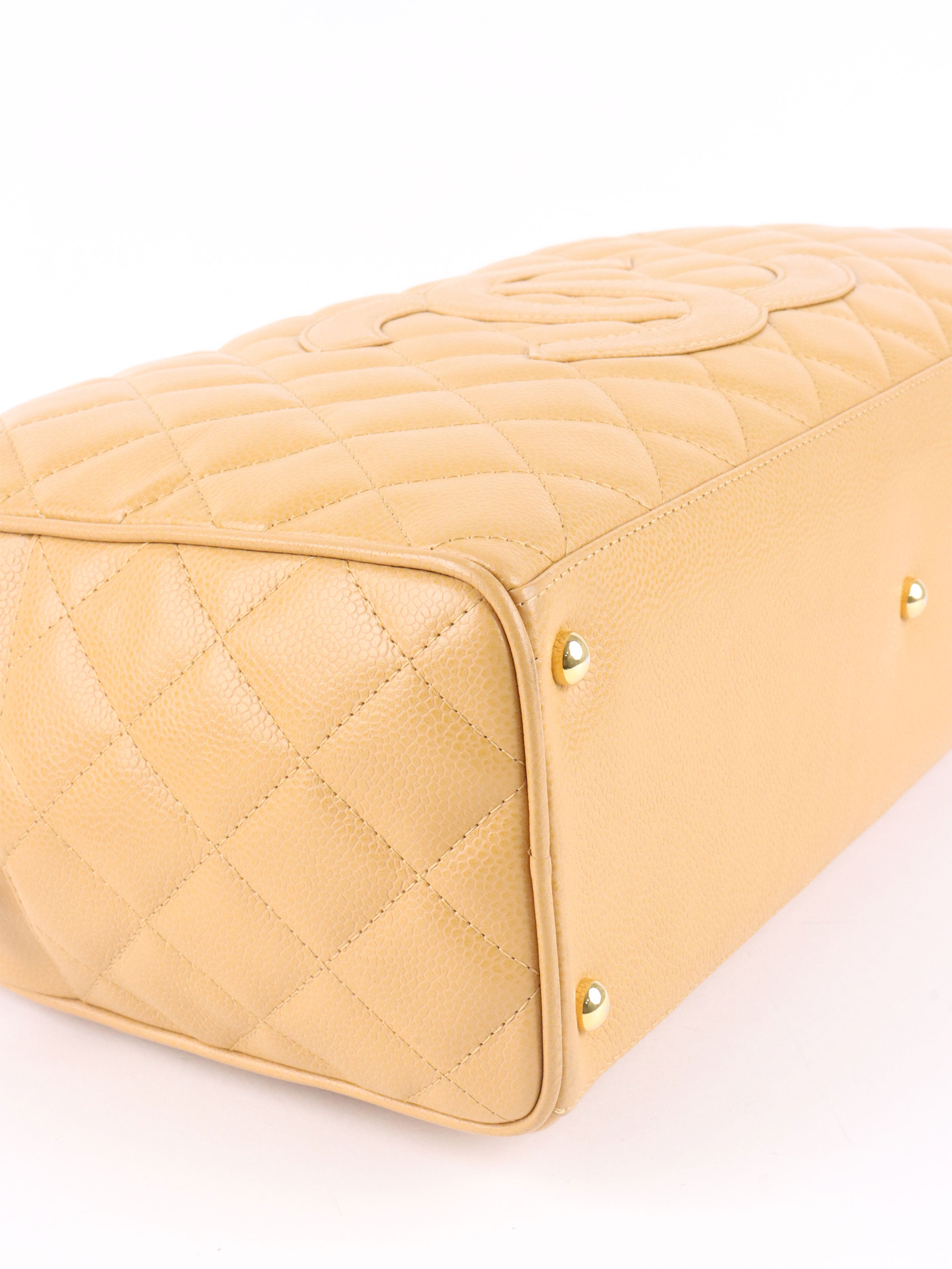 Chanel Beige Caviar Bowling Bag.