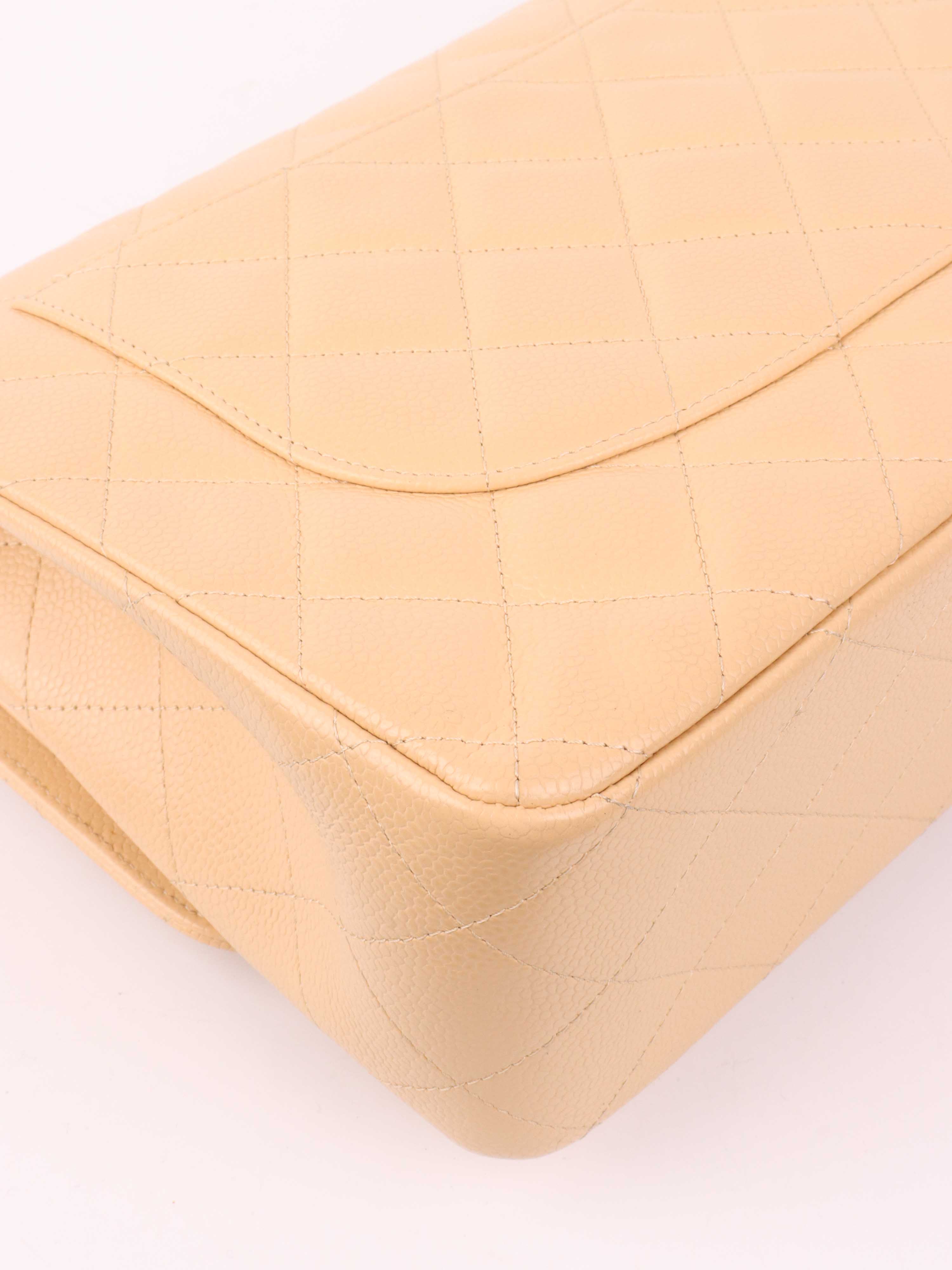 Chanel Beige Caviar Jumbo Classic Flap.