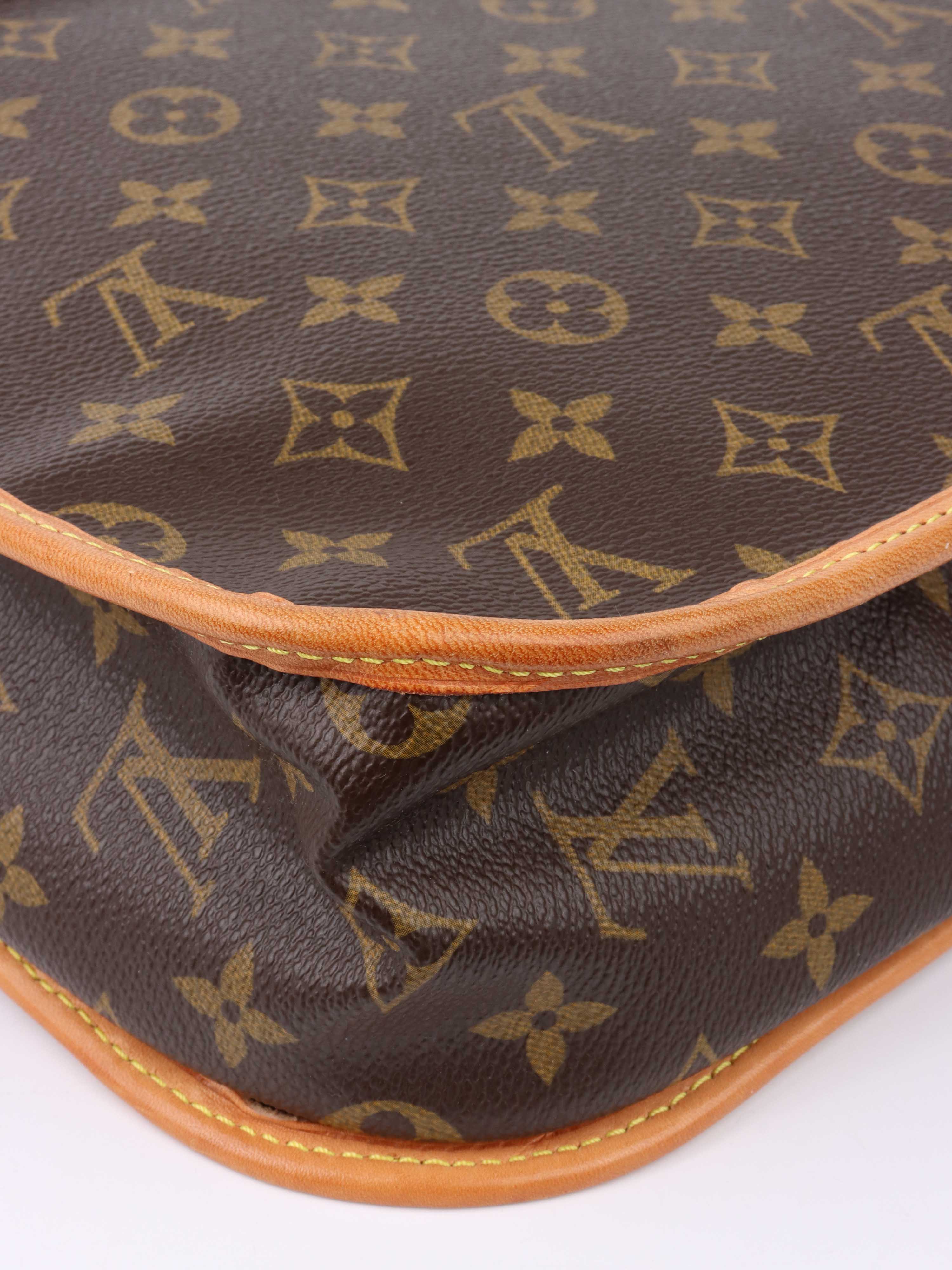 Louis Vuitton Monogram Messenger Bag.