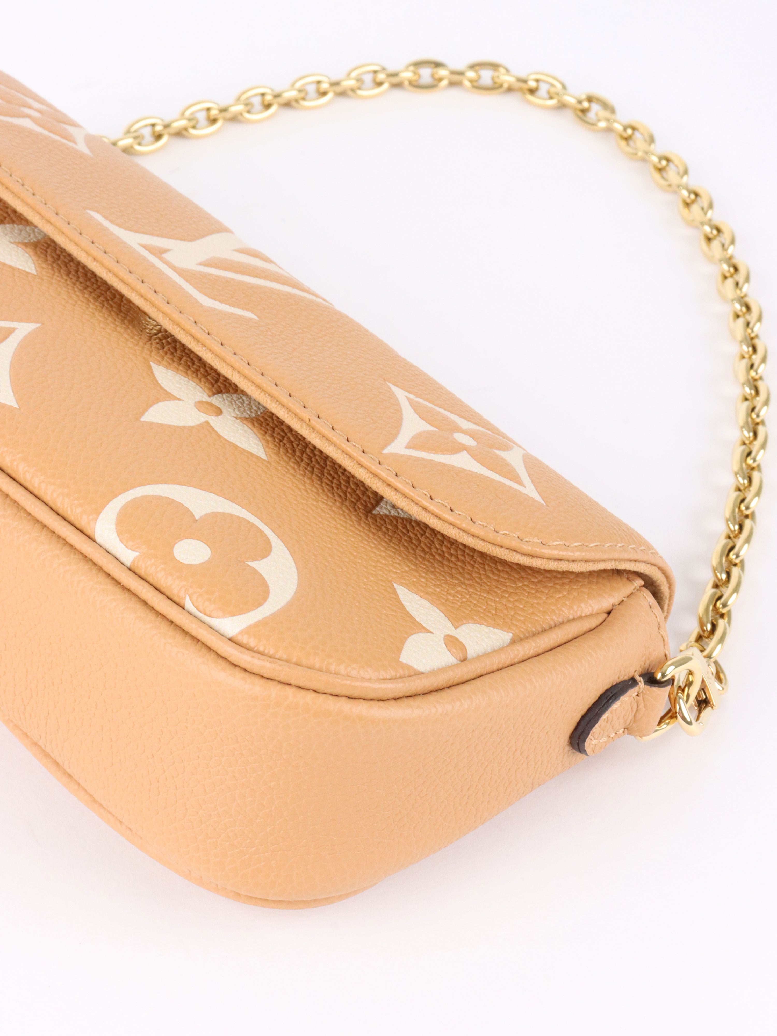 Louis Vuitton  Bi-colour Ivy Wallet On Chain.