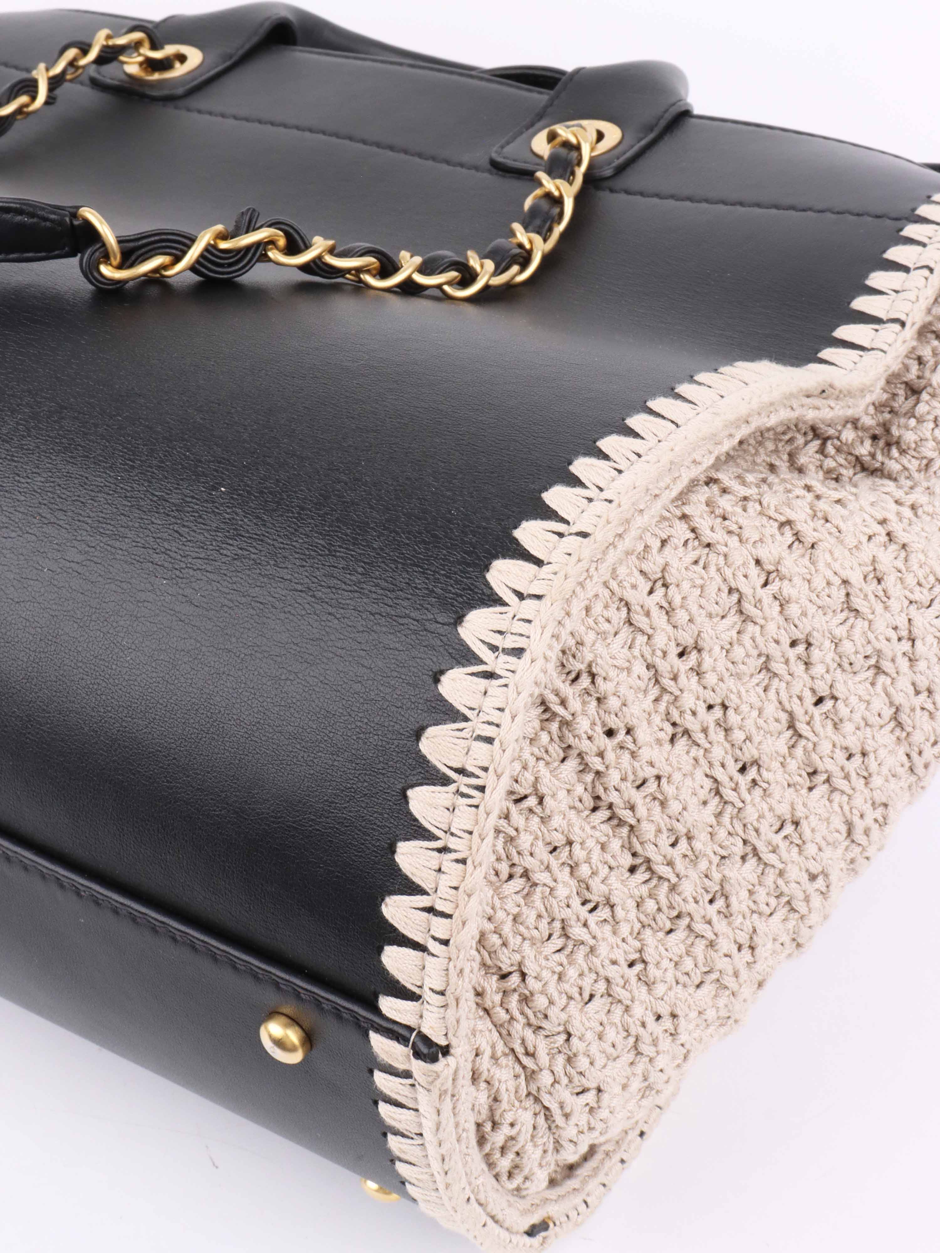 Chanel Black 
Raffia Deauville Tote.