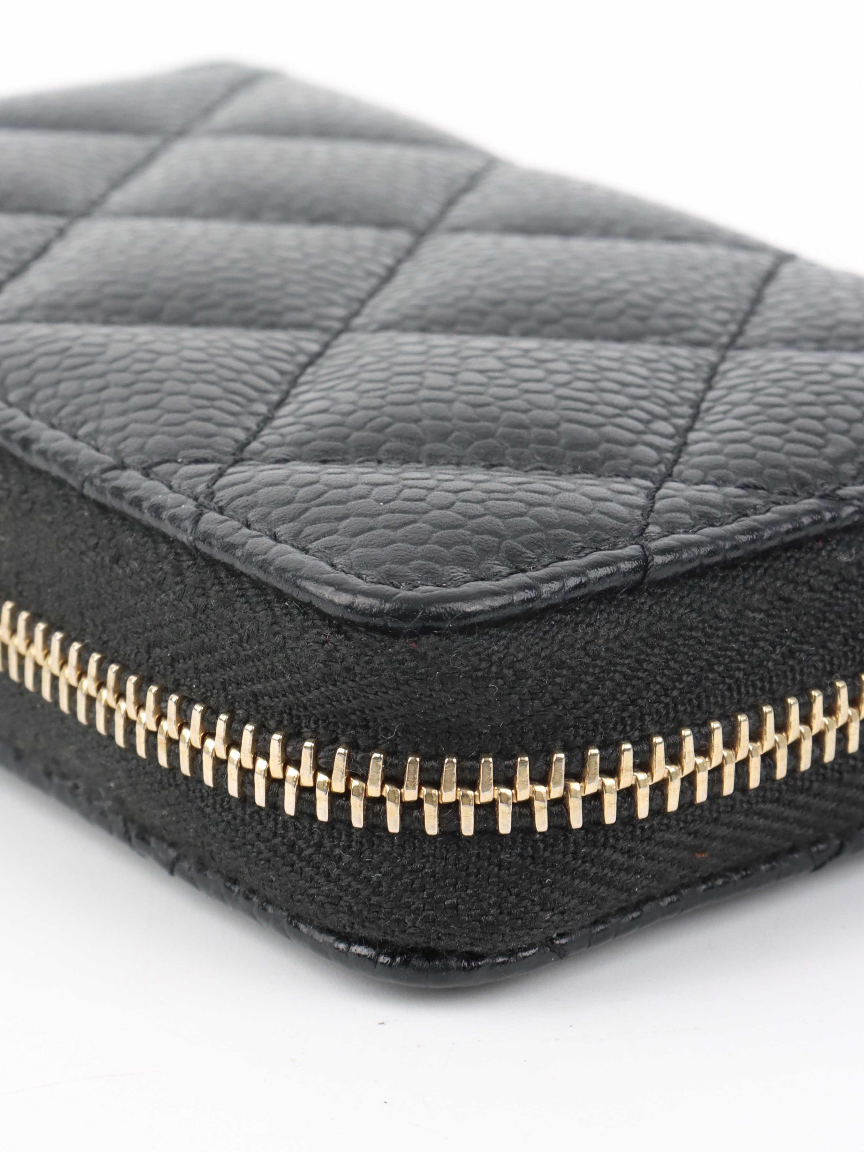 Chanel Black Caviar Zip Card Holder.