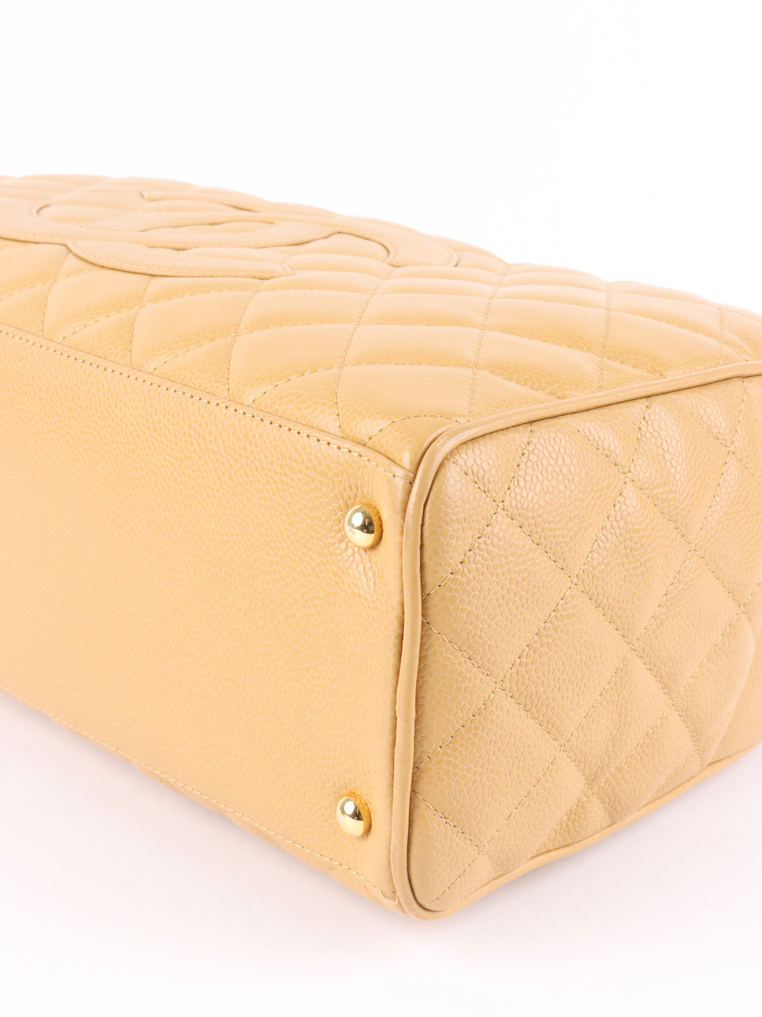 Chanel Beige Caviar Bowling Bag.