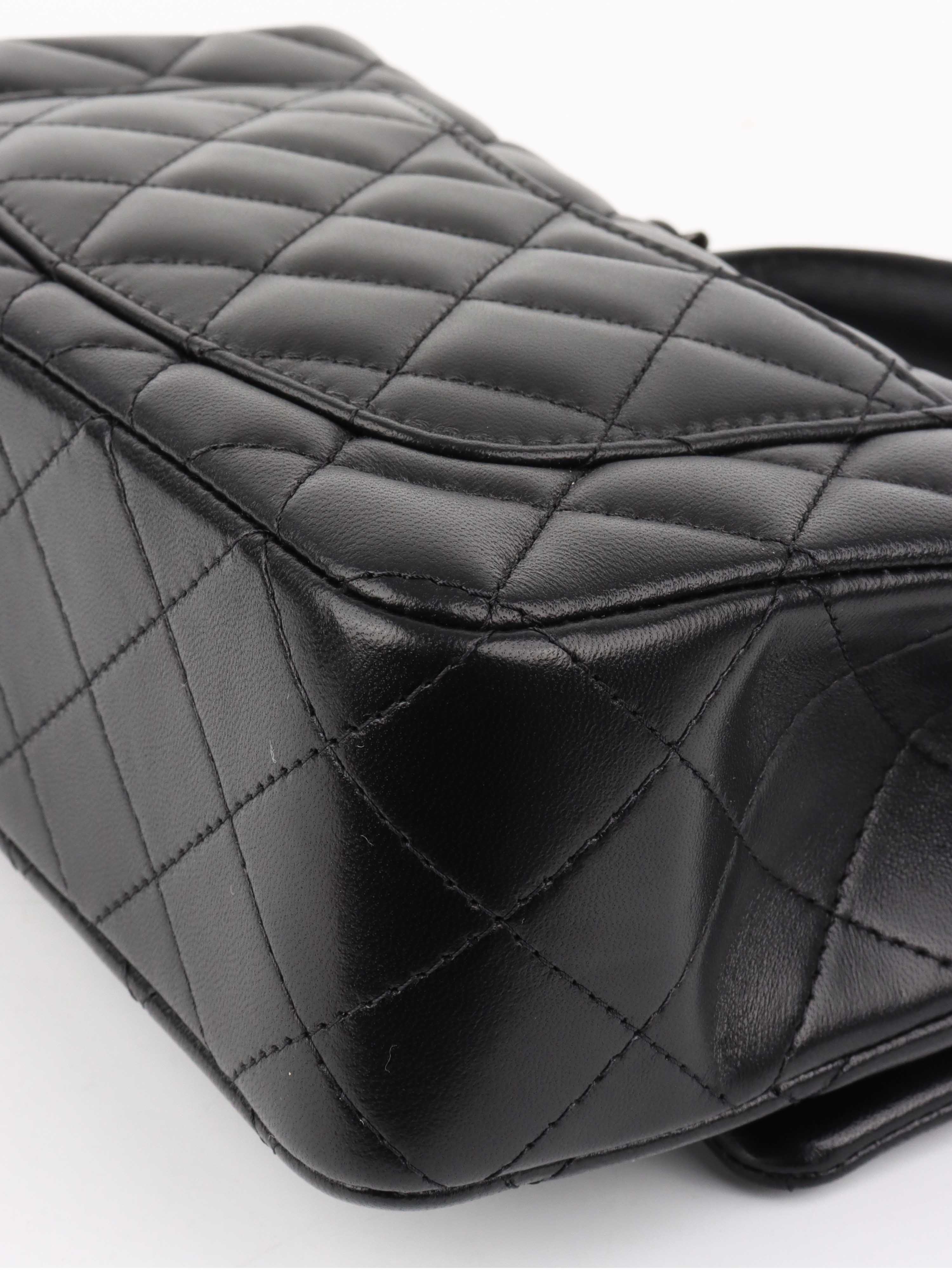 Chanel All Black Rectangular Classic Flap with Handle.