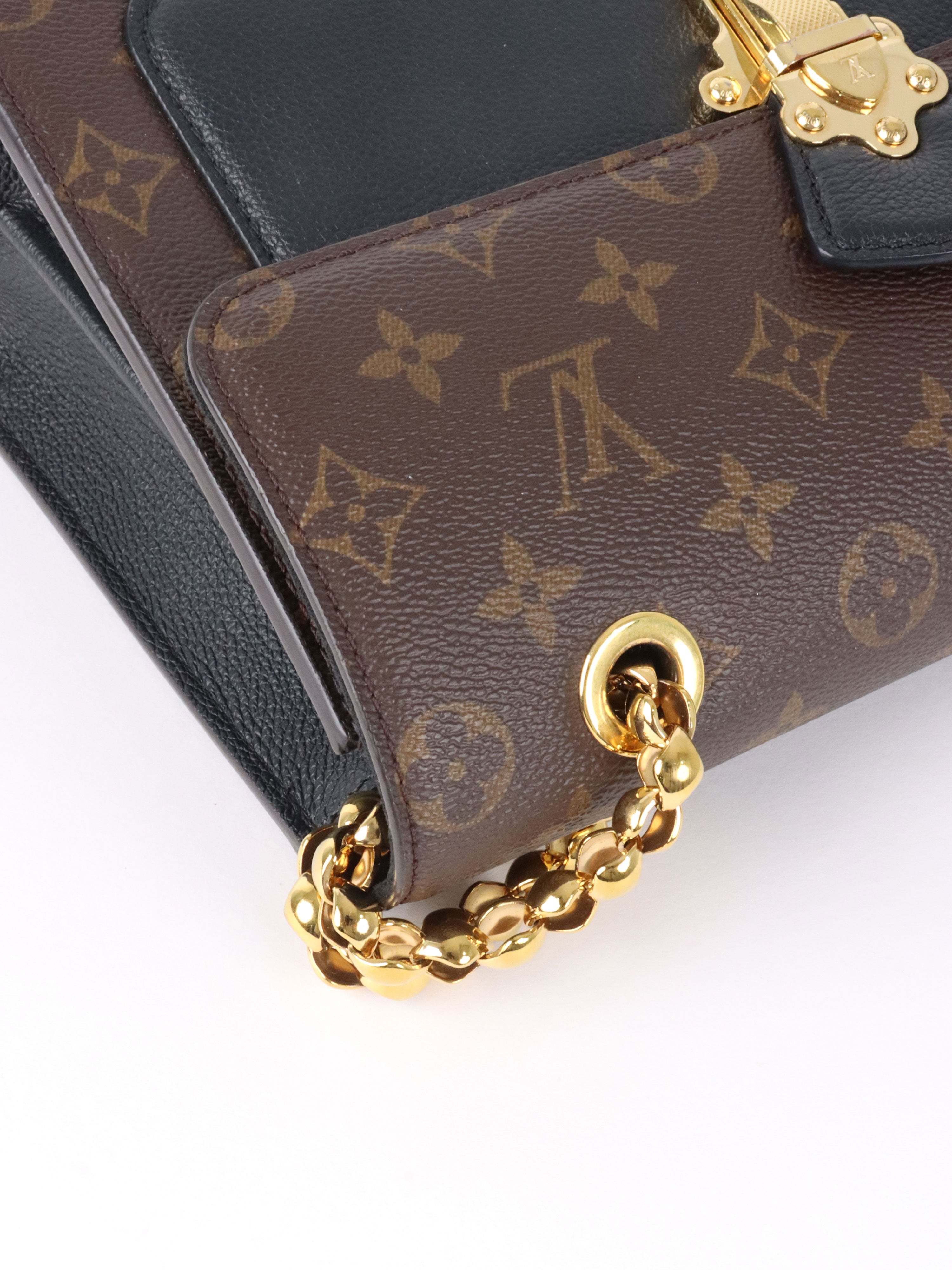 Louis Vuitton Black Victoire MNG MM Bag.
