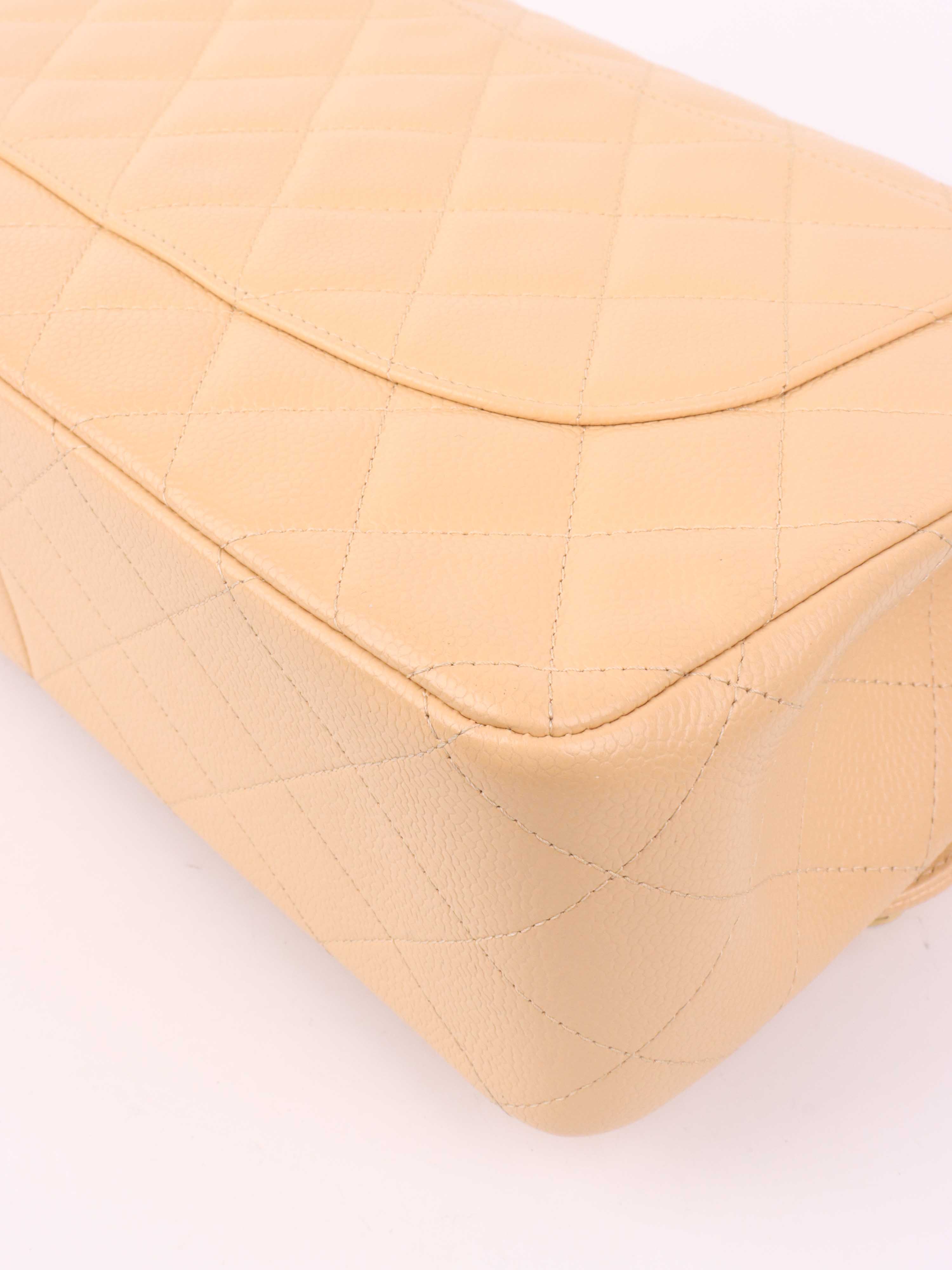 Chanel Beige Caviar Jumbo Classic Flap.