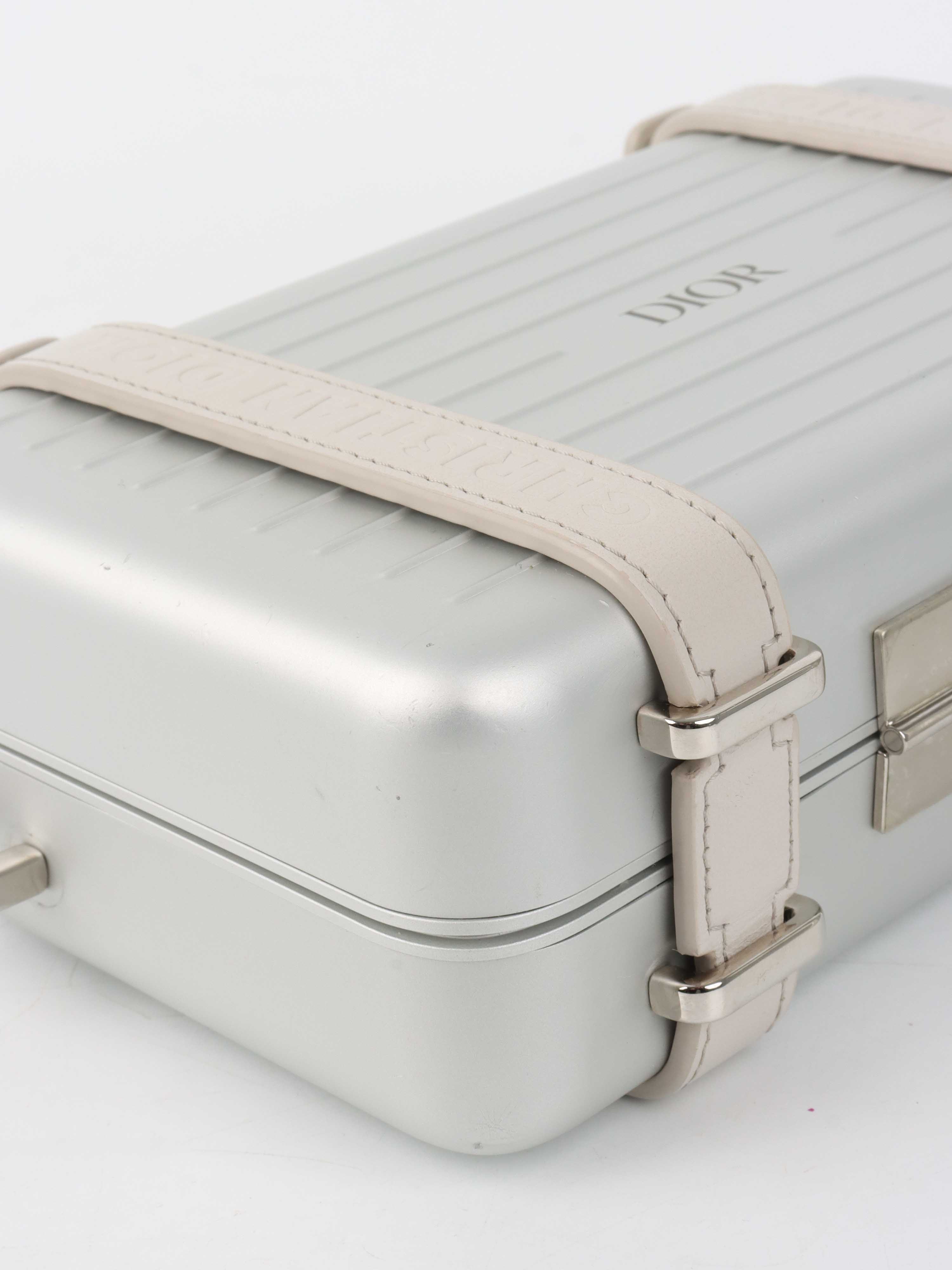 Dior x RIMOWA Silver Personal Clutch Case.