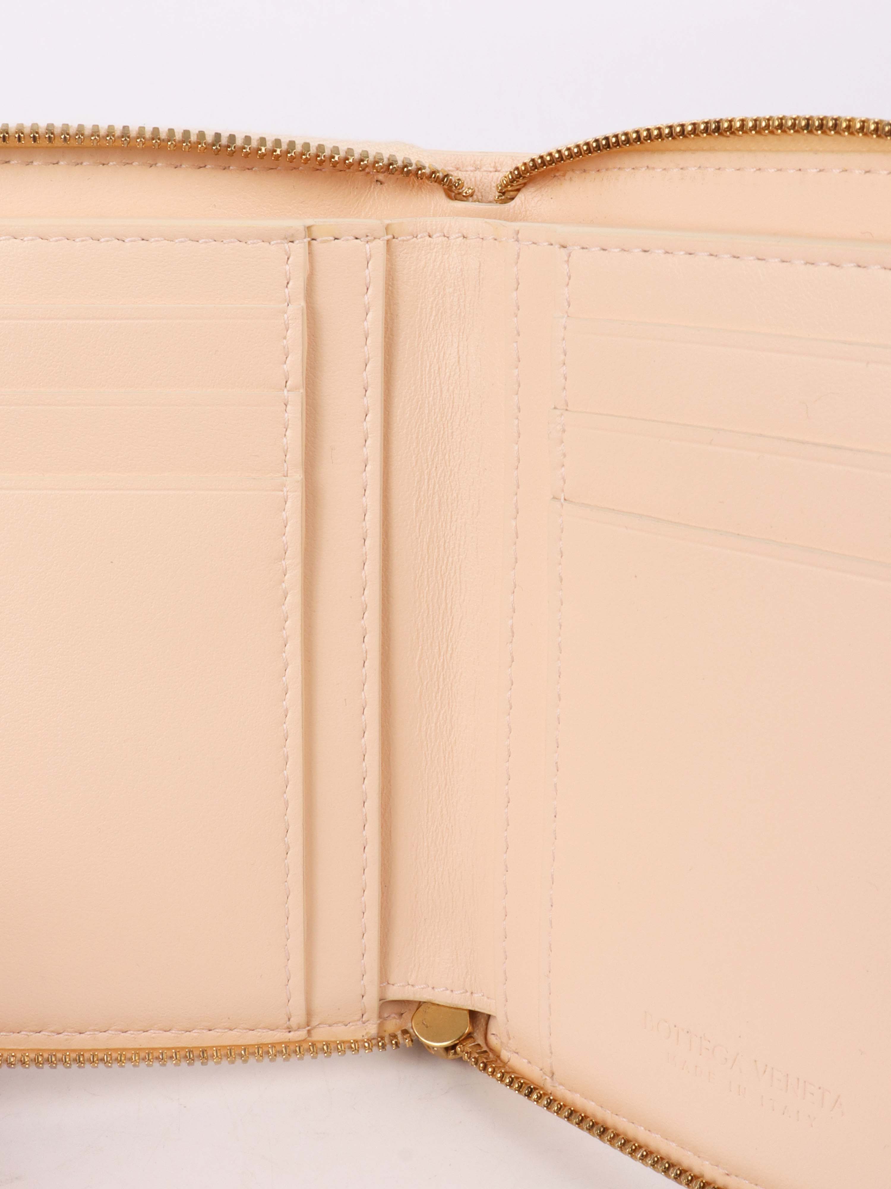 Bottega Veneta Light Pink Cassette Small Bi-Fold Wallet.