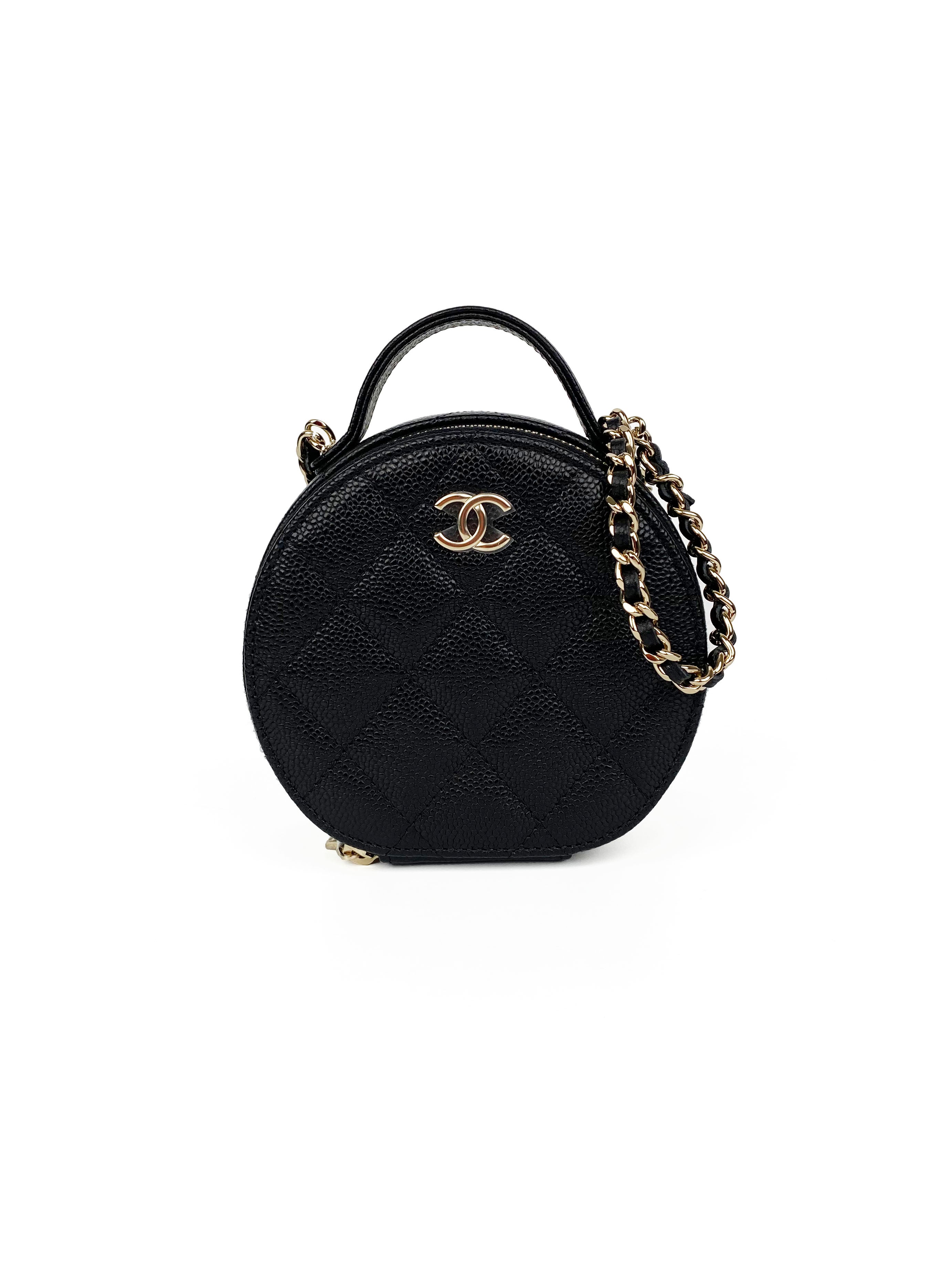 ChanelBlack22CTopHandleVanityBag-1.jpg