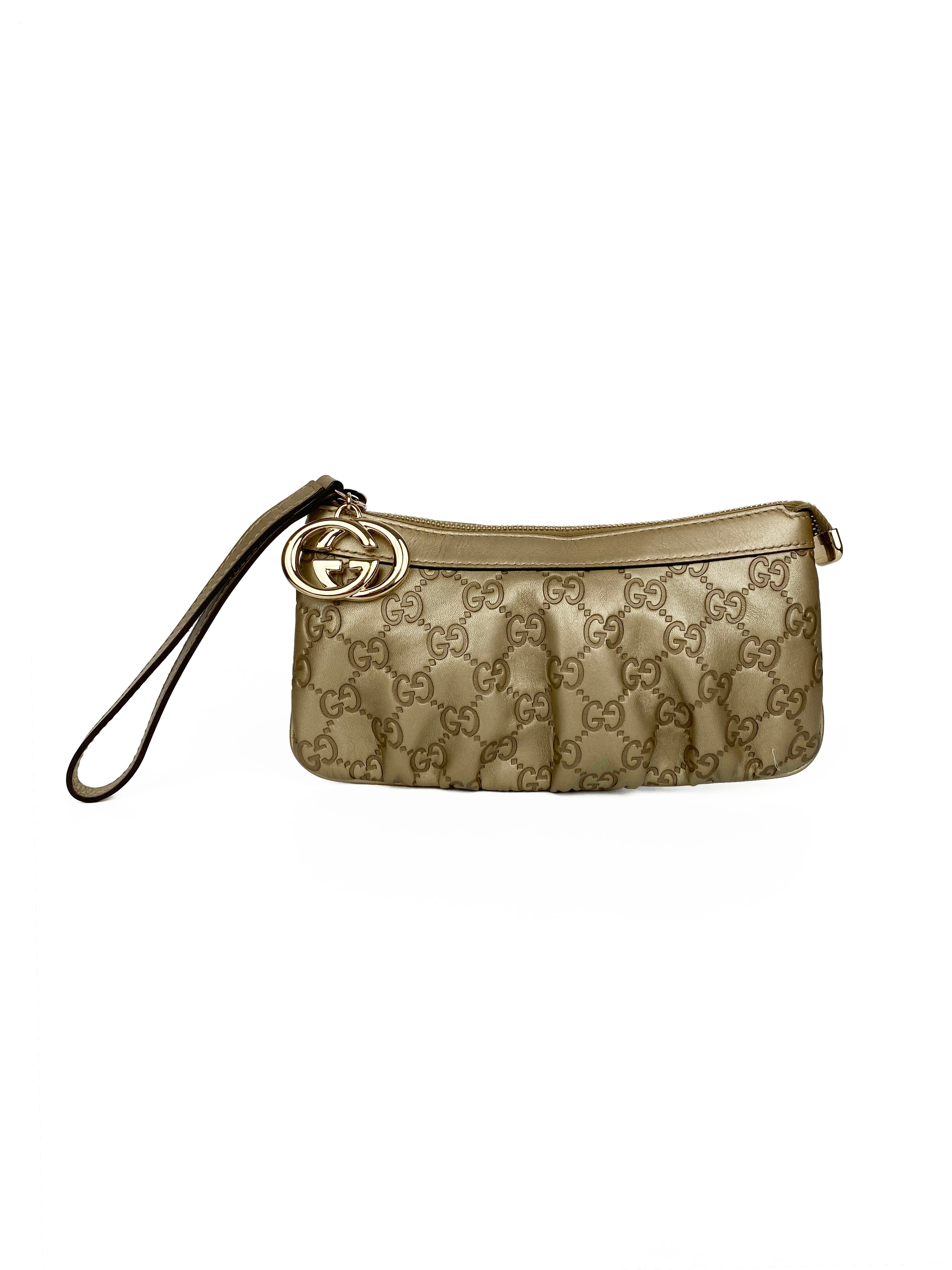 GucciGoldGuccissimaBrittClutch-1.jpg