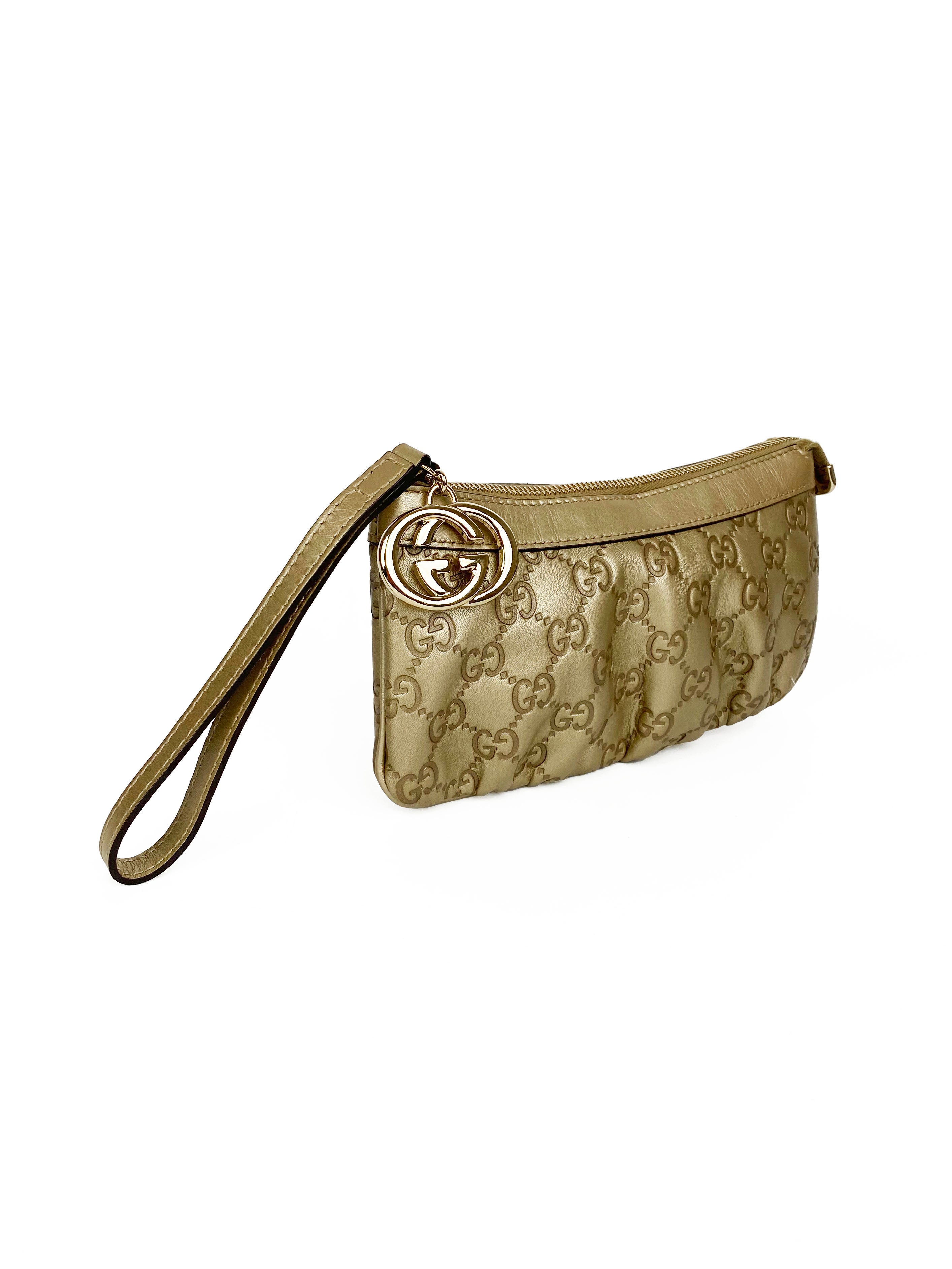 GucciGoldGuccissimaBrittClutch-10_d6d29f21-99df-4cc4-9d1d-43156945e67c.jpg